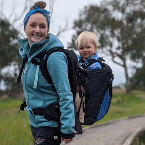 mum with toddler in baby carrier backpack