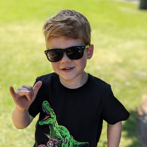 boy wearing kids black polarized sunglasses